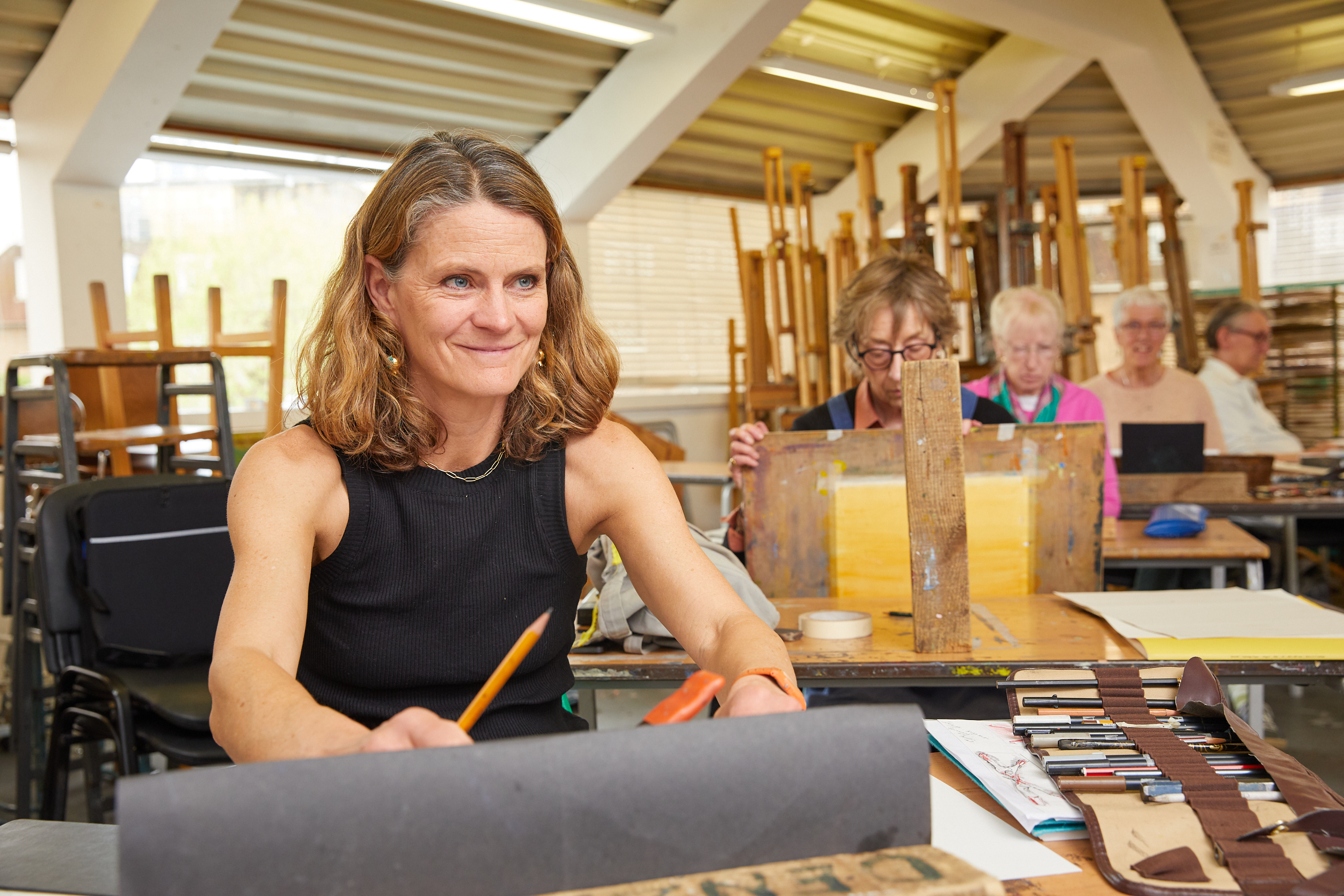 Women in art studio sketching