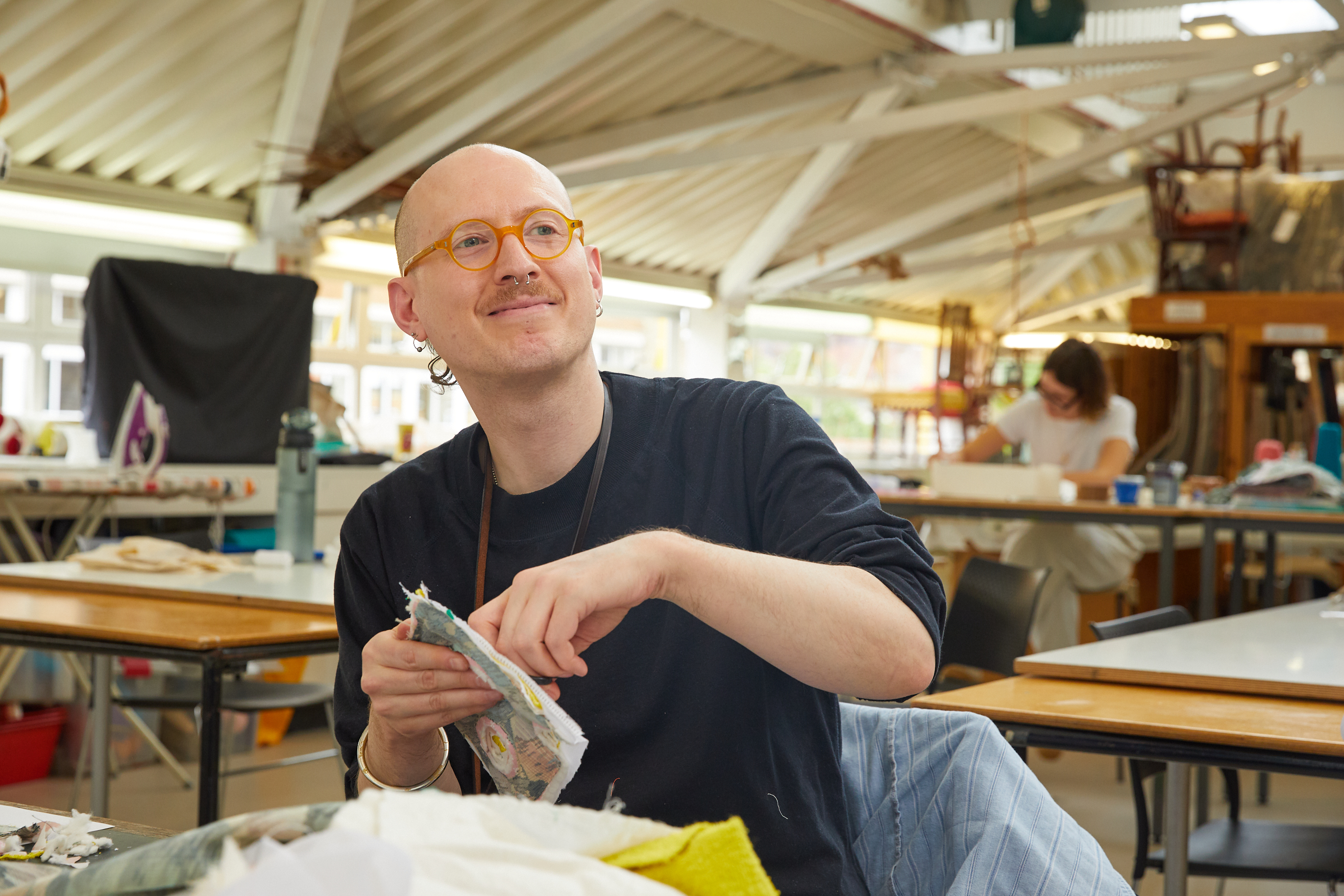 Man in textiles studio